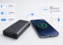 Powerbank lädt Smartphone und zeigt verschiedene mAh-Kapazitäten als Vergleich